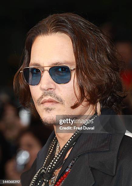 Johnny Depp attends the European premiere of Dark Shadows at Empire Leicester Square on May 9, 2012 in London, England.