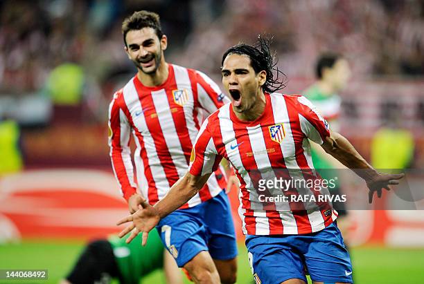 Atletico Madrid's Colombian forward Radamel Falcao celebrates after scoring a goal during the UEFA Europa League final football match between Club...