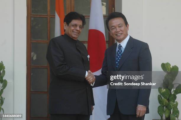 Indian Foreign Minister E. Ahamed with his Japanese counterpart Taro Aso in New Delhi.