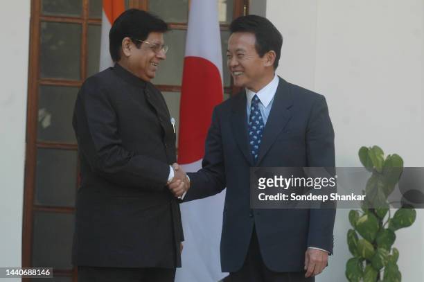 Indian Foreign Minister E. Ahamed with his Japanese counterpart Taro Aso in New Delhi.