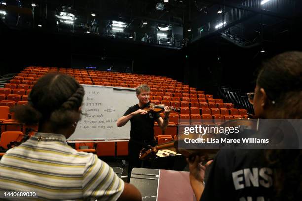 Concert master Warwick Adeney of the Queensland Symphony Orchestra conducts an intimate workshop with members of the Ensemble Nabanga at the Empire...