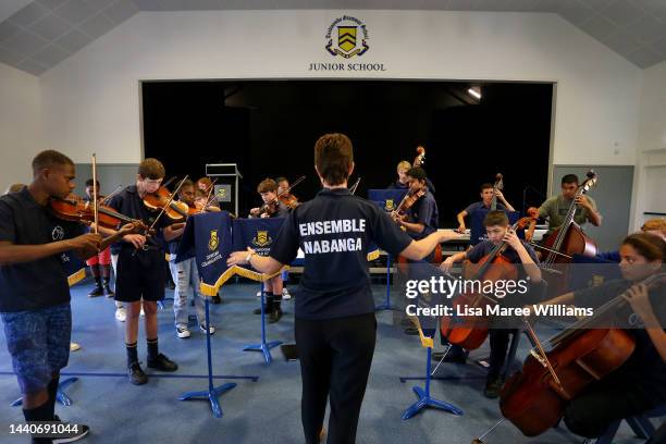 Teacher Barbara Idieder leads the Ensemble Nabanga and music students of Toowoomba Junior Grammar School in a performance on November 10, 2022 in...