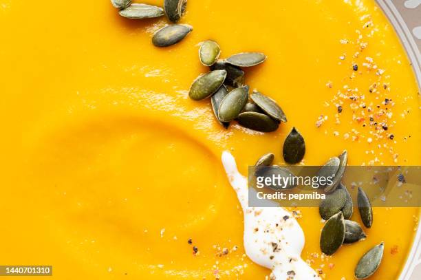 pumpkin and carrot soup - mashed sweet potato imagens e fotografias de stock