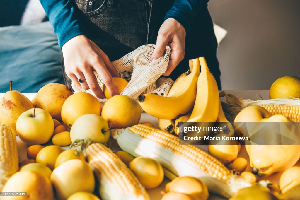 Eco friendly shopping mesh bag with fruit.