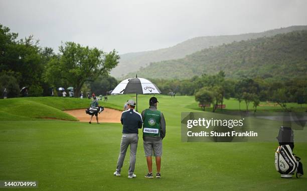 Guido Migliozzi of Italy waits with his caddie on the second hole during Day Two of the Nedbank Golf Challenge at Gary Player CC on November 11, 2022...