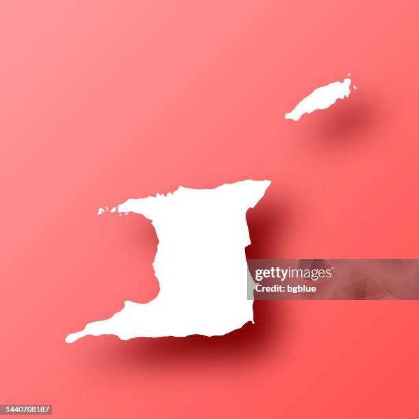 trinidad and tobago map on red background with shadow - port of spain trinidad stock illustrations