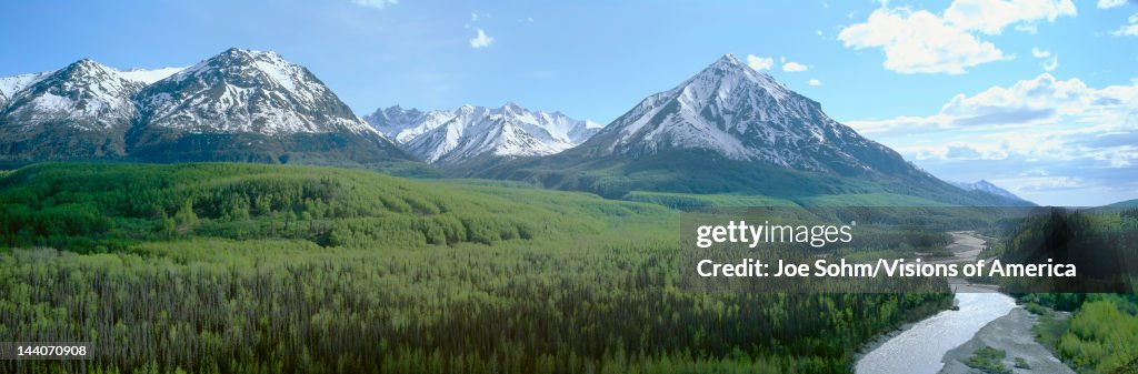 Snowy mountains, green forests and river in Matanuska Valley, Alaska