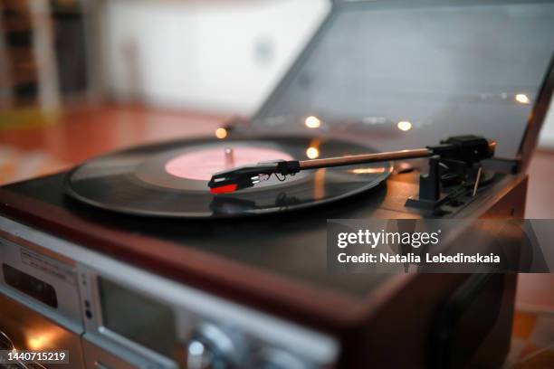 modern record player. closeup and soft focus. - lp fotografías e imágenes de stock