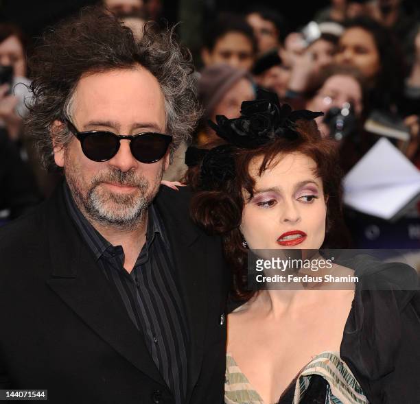 Tim Burton and Helena Bonham-Carter attend the UK premiere of Dark Shadows at Empire Leicester Square on May 9, 2012 in London, England.