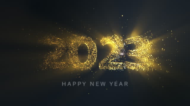 Happy New Year 2023, Gold particles fly, Glittering light ray beam background.