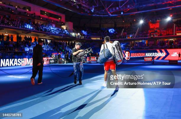 Brandon Nakashima walks onto during day one of the Next Gen ATP Finals at Allianz Cloud on November 08, 2022 in Milan, Italy.