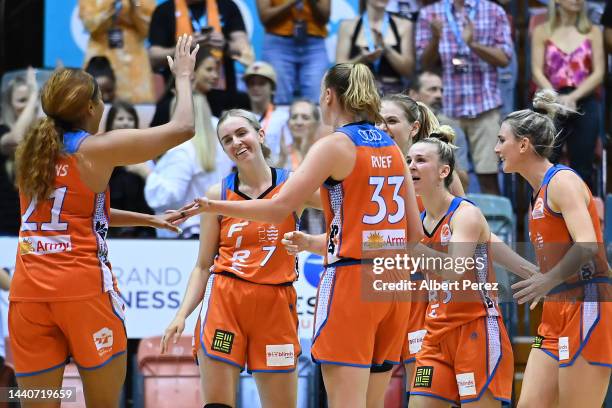 Townsville Fire celebrate victory during the round two WNBL match between the Townsville Fire and the Adelaide Lightning at Townsville Entertainment...