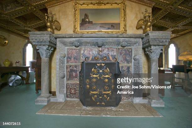 Interior of guest bedroom with fireplace at Hearst Castle, "America's Castle," San Simeon, Central California Coast