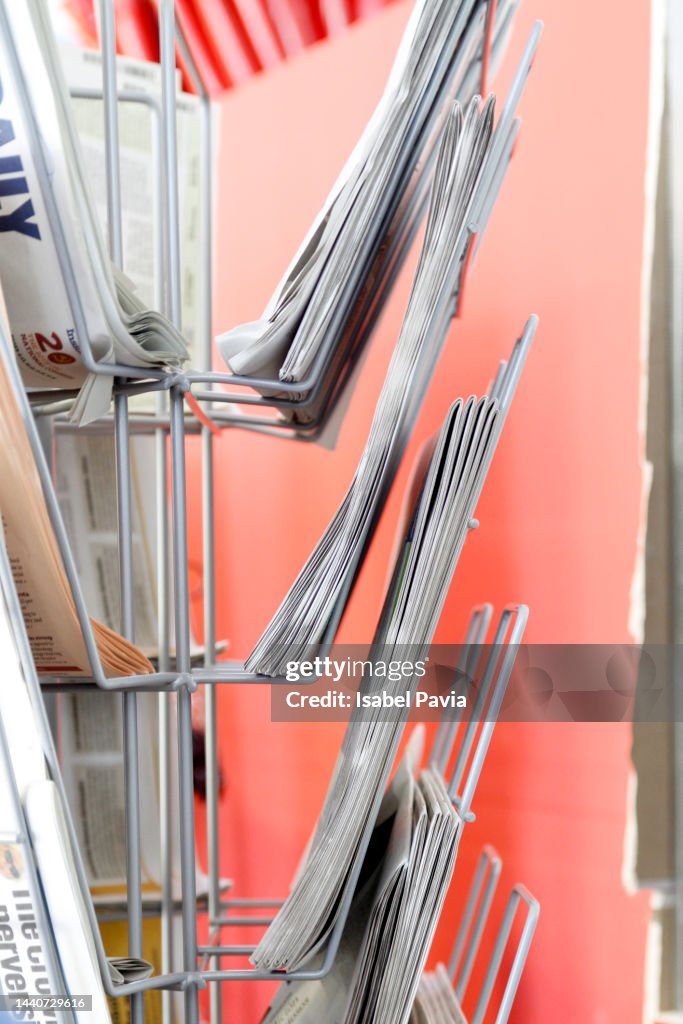 Stack of newspapers for sale