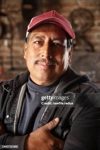 a friendly looking tradesman - tradesman real people man stock pictures, royalty-free photos & images