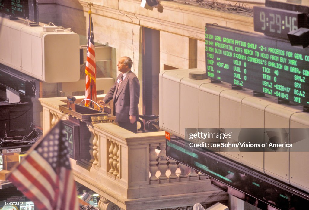 Opening bell on New York Stock Exchange, Wall Street, New York, NY