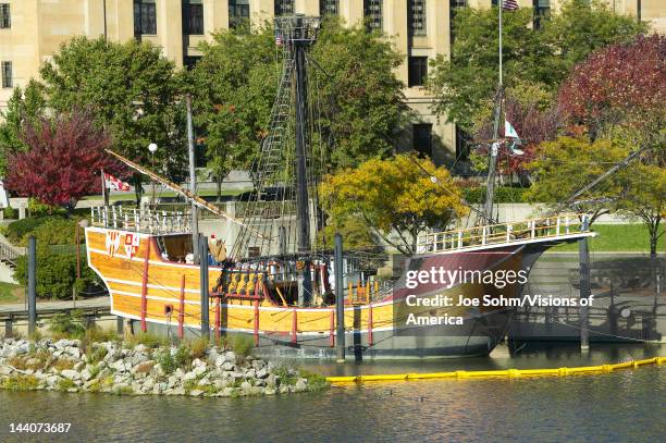 Replica of Columbus' ship the Santa Maria on Scioto River, Columbus Ohio skyline in autumn