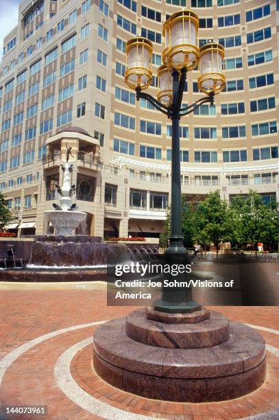 Streetlights in front of Reston, VA town center, a planned community