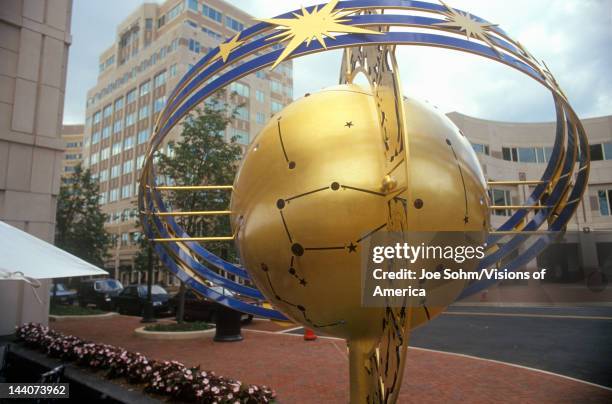 Globe and constellation sculpture in Reston, VA town center, a planned community