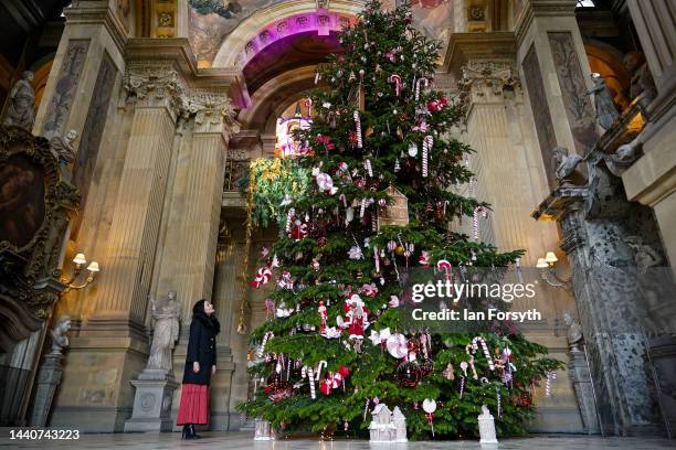 Designer Charlotte Lloyd Webber makes finishing touches as she poses for pictures as Christmas decorations go up at Castle Howard as they prepare to...