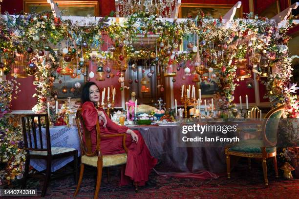 Designer Charlotte Lloyd Webber makes finishing touches as she poses for pictures as Christmas decorations go up at Castle Howard as they prepare to...