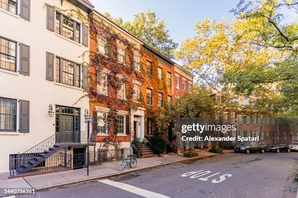 street in greenwich village with residential houses, new york city, usa - west village stock pictures, royalty-free photos & images