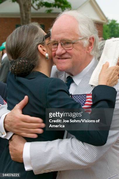 Senior man hugging female friend on July 4, 2005 at Thomas Jefferson's home, Monticello