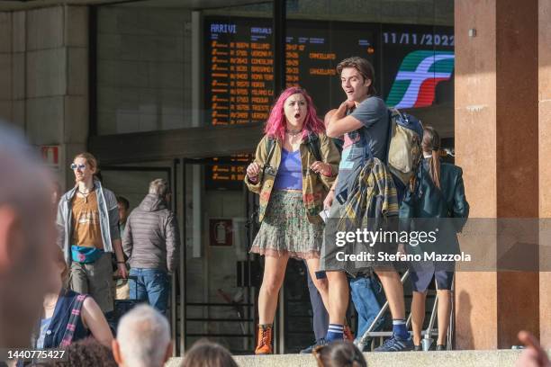 British actress Liv Hill and British actor Louis Partridge walk at Venice train station during filming for an Apple TV production scheduled to air in...