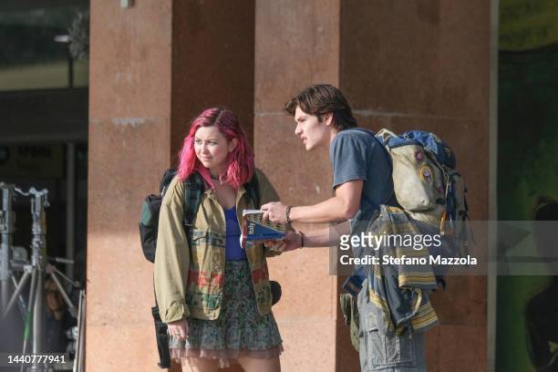 British actress Liv Hill and British actor Louis Partridge look at the Venice train station forecourt during filming for an Apple Tv production...