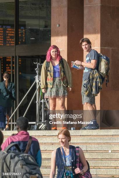 British actress Liv Hill and British actor Louis Partridge walk at Venice train station during filming for an Apple Tv production scheduled to air in...