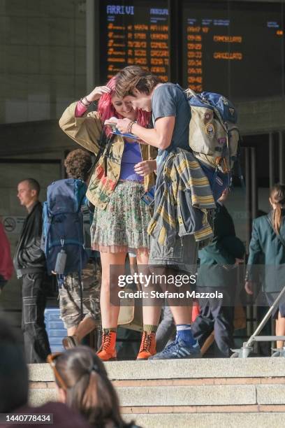 British actress Liv Hill and British actor Louis Partridge walk at Venice train station during filming for an Apple Tv production scheduled to air in...