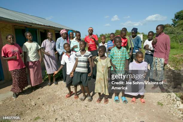 Group of HIV/AIDS infected children sing song about AIDS at the Pepo La Tumaini Jangwani, HIV/AIDS Community Rehabilitation Program, Orphanage &...