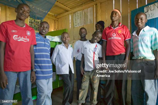 Group of young Kenyan males, who are affected with HIV/AIDS, pose for camera at Pepo La Tumaini Jangwani, HIV/AIDS Community Rehabilitation Program,...