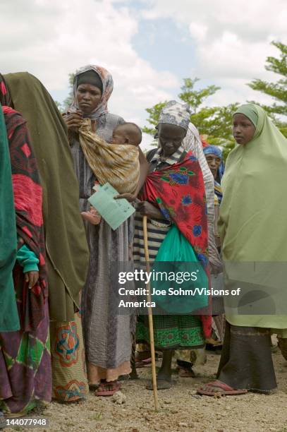 Kenyan women stand in line to get health checkup for HIV/AIDS at the Pepo La Tumaini Jangwani, HIV/AIDS Community Rehabilitation Program, Orphanage &...