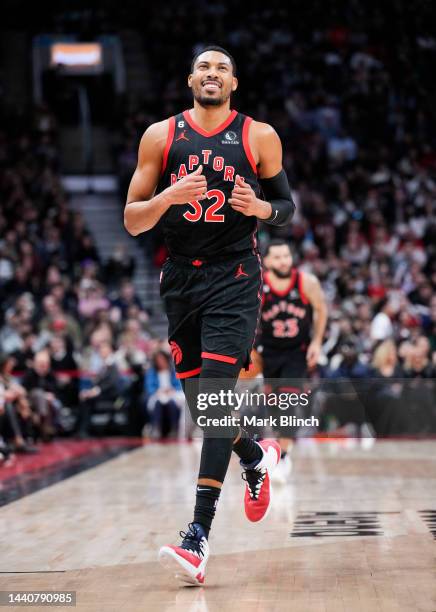 Otto Porter Jr. #32 of the Toronto Raptors smiles while playing against the Houston Rockets during the second half of their basketball game at the...