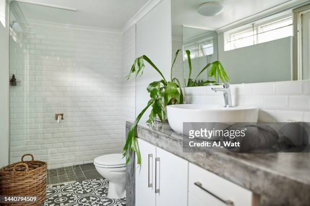 bathroom interior of contemporary home - brightly lit bathroom stock pictures, royalty-free photos & images