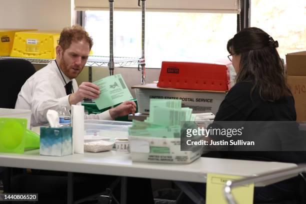 Maricopa County recorder Stephen Richer opens mail in ballots at the Maricopa County Tabulation and Election Center on November 11, 2022 in Phoenix,...