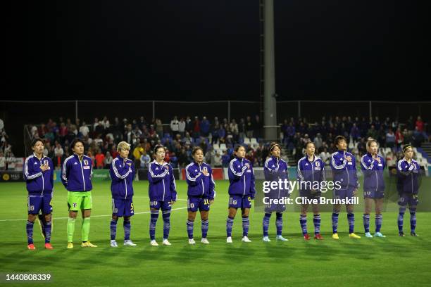 Players of Japan line up for the national anthem prior to the International Friendly between England and Japan at Pinatar Arena on November 11, 2022...