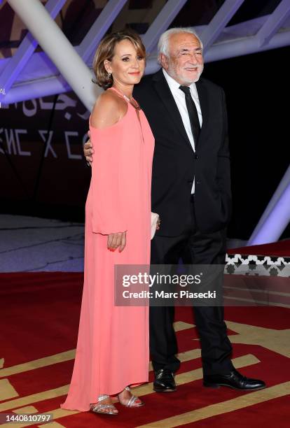 Myriam L'Aouffir and Dominique Strauss-Kahn attend the opening ceremony during the 19th Marrakech International Film Festival on November 11, 2022 in...