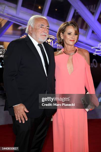 Dominique Strauss-Kahn and Myriam L'Aouffir attend the opening ceremony during the 19th Marrakech International Film Festival on November 11, 2022 in...