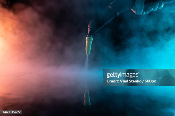 steam clean black and neon light concept - energy industry heat steam stock pictures, royalty-free photos & images