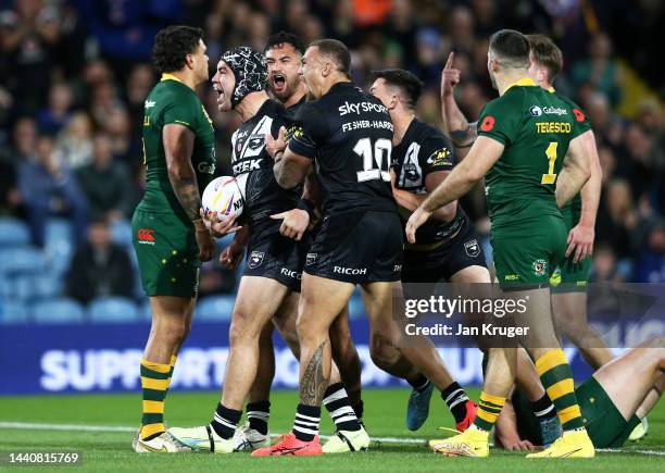 Jahrome Hughes of New Zealand celebrates their sides first try during the Rugby League World Cup Semi-Final match between Australia and New Zealand...