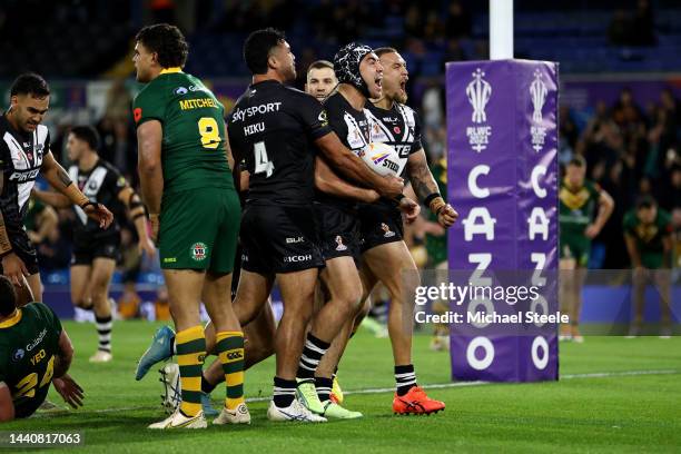 Jahrome Hughes of New Zealand celebrates their sides first try during the Rugby League World Cup Semi-Final match between Australia and New Zealand...