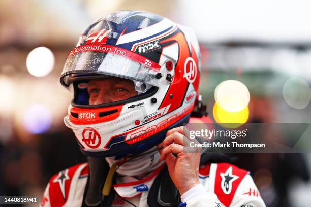 Pole position qualifier Kevin Magnussen of Denmark and Haas F1 walks into parc ferme during qualifying ahead of the F1 Grand Prix of Brazil at...