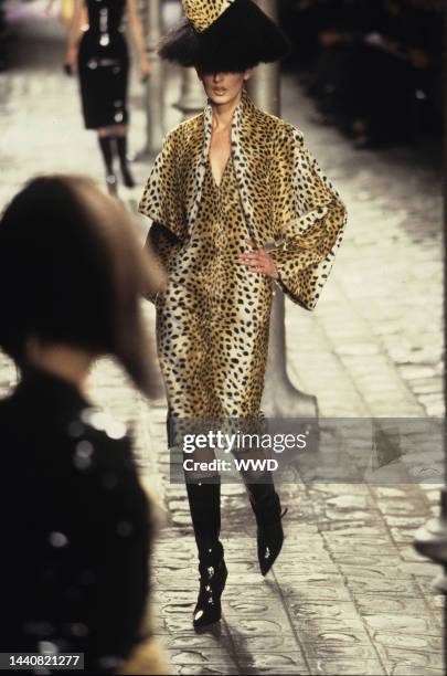 Leopard-print jacket worn over matching dress in the Givenchy Fall/Winter 1997 Ready-to-Wear show in Paris designed by Alexander McQueen