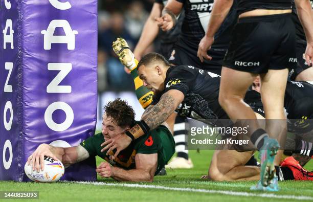 Cameron Murray of Australia goes over to score their sides third try during the Rugby League World Cup Semi-Final match between Australia and New...