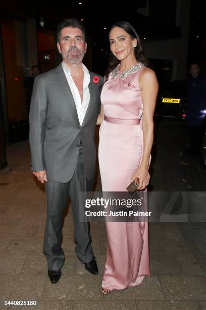 Simon Cowell and Lauren Silverman arrive for the Shooting Star Ball at the Royal Lancaster Hotel on November 11, 2022 in London, England.