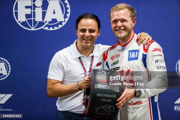 Felipe Massa of Brazil congratulates Kevin Magnussen of Denmark and Haas on getting pole position during practice/qualifying ahead of the F1 Grand...