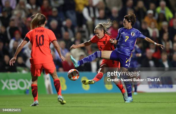 Georgia Stanway of England battles for possession with Hinata Miyazawa of Japan during the International Friendly between England and Japan at...