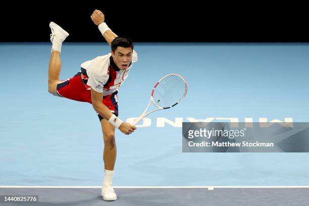 Brandon Nakashima of United States serves to Jack Draper of Great Britain during the semifinals on Day Four of the Next Gen ATP Finals at Allianz...
